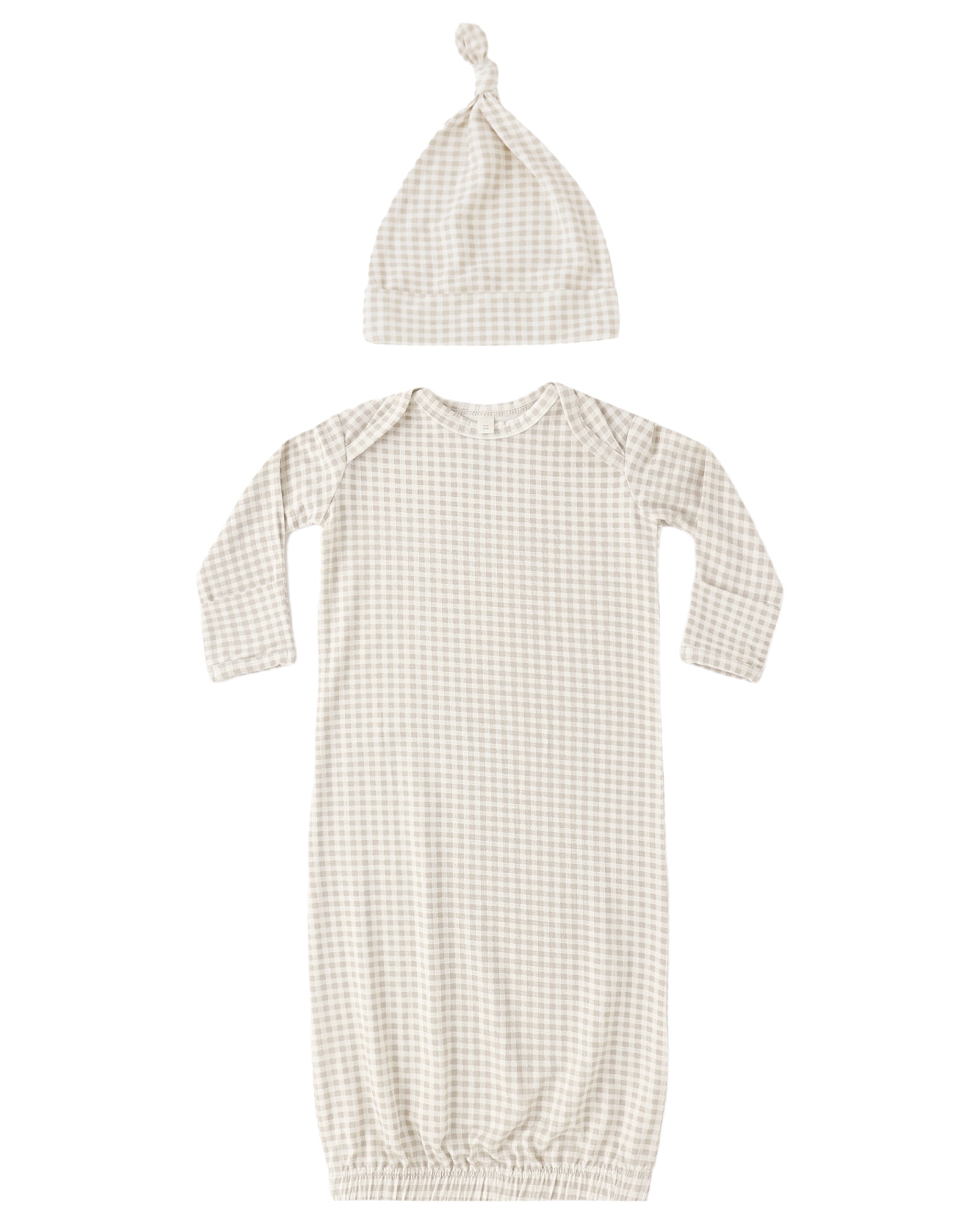 Baby gown and hat set with oat gingham pattern on a white background